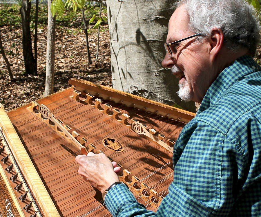 musician playing hammered dulcimer