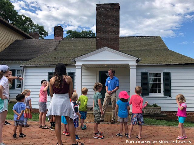 Children listening to Highland tour guide