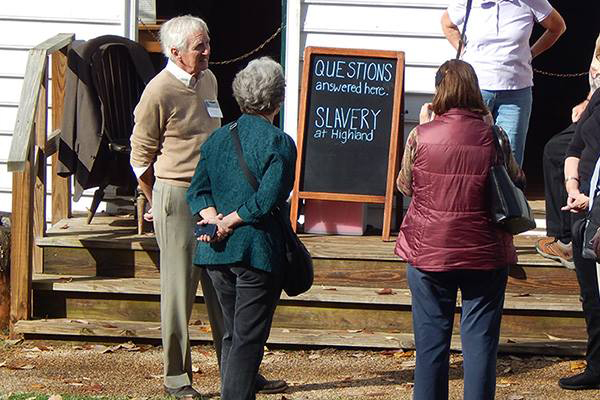 Guests learning about enslaved workers